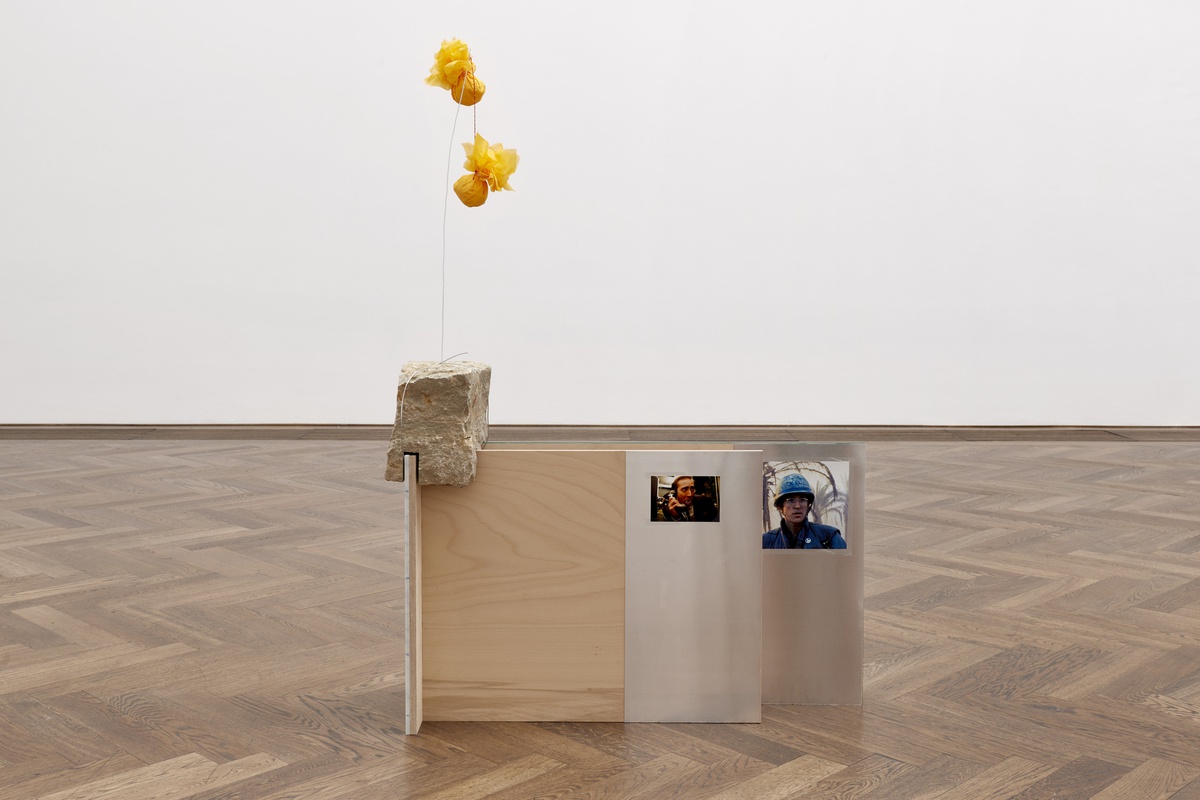 Phung-Tien Phan, Tom 1, 2023aluminium, digital print on paper, wood, cable ties, marble, serviettes, doll clothing, wire, stone, fabric cord, cellophane153 x 38 x 23 cmInstallation View at Kunsthalle Basel