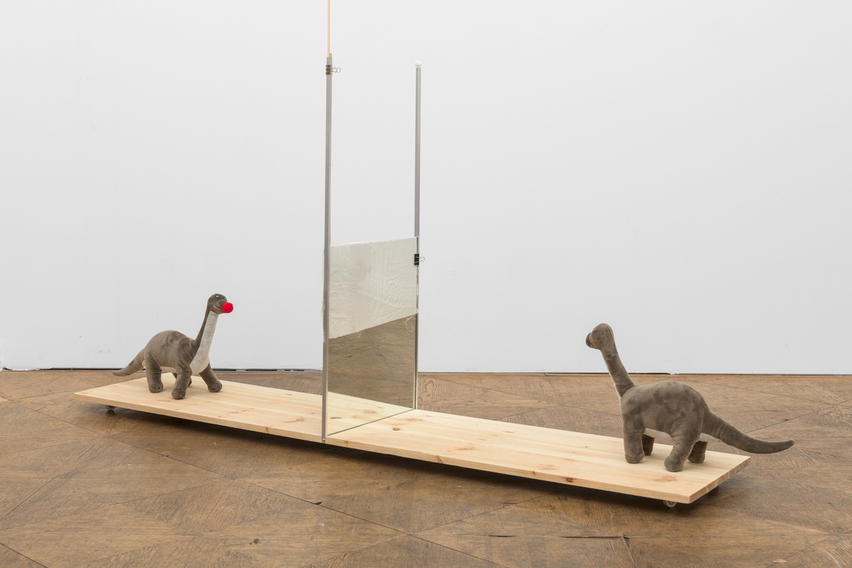 Phung-Tien Phan,Dino Egal, 2025wheels, wood, mirror, glass, cloth, alluminium rods, wooden sticks, string, dino, feather, plush ball354 x 200 x 40 cm